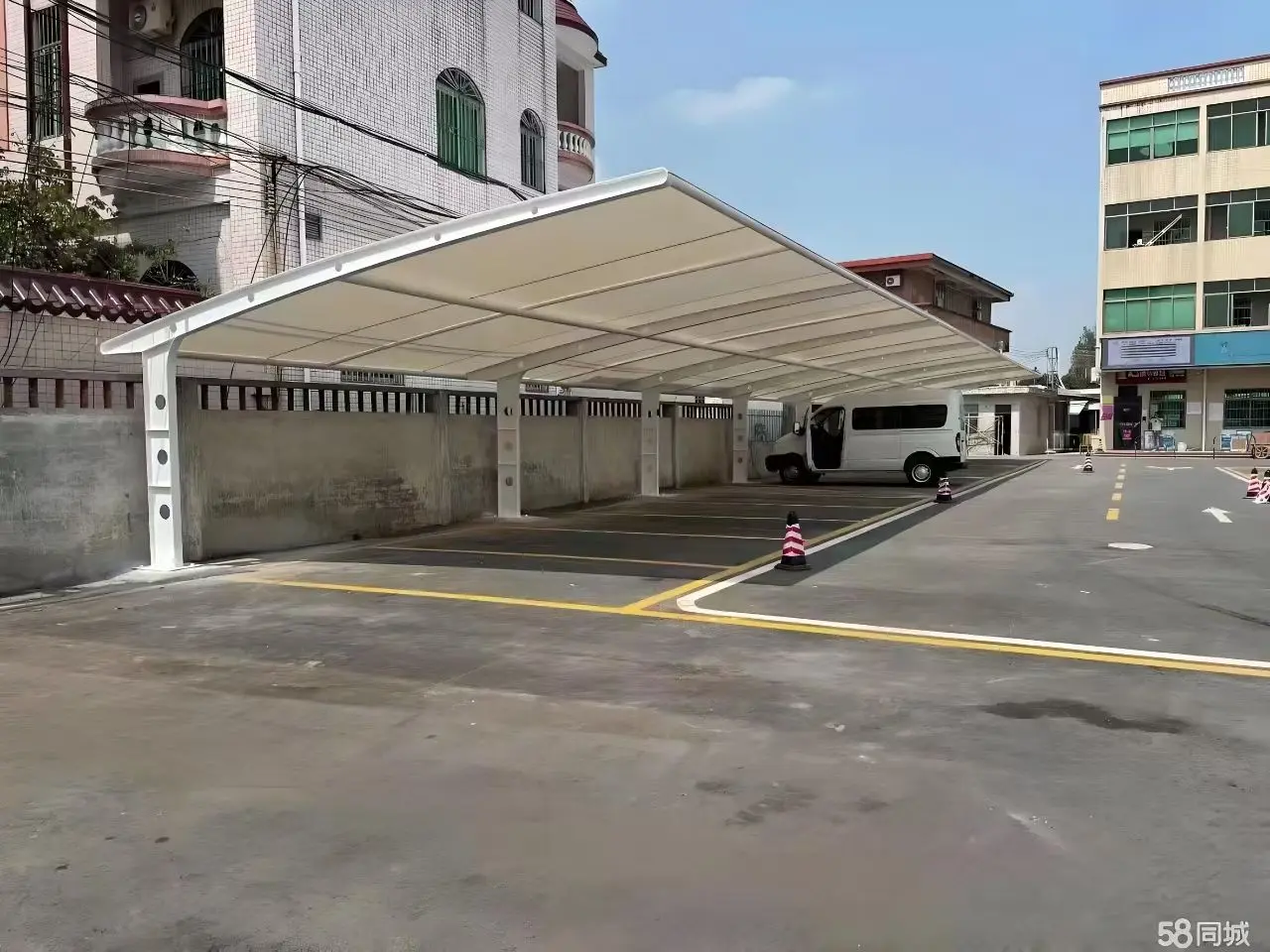 贵州正安膜结构工程科普:山地多雨强紫外环境,停车棚选材别只看低价